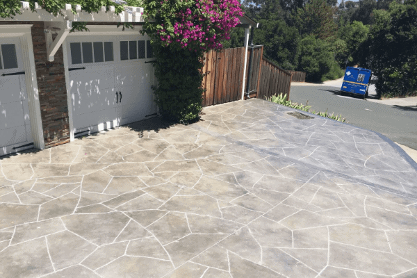 How to Repair Cracks and Resurface a Concrete Driveway