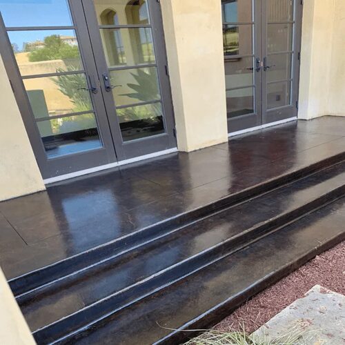 Stylish concrete steps leading to a door